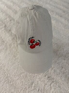 H&M cream baseball cap with red tomatoes